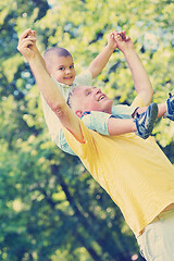 Image showing happy grandfather and child in park