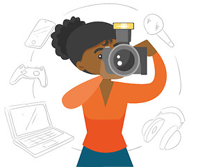 Image showing Black woman making a photo with modern camera