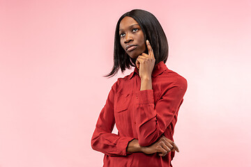 Image showing Young serious thoughtful business woman. Doubt concept.