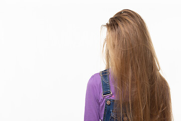 Image showing Teen girl covered her face with long hair