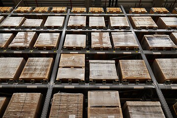 Image showing Warehouse with stocked shelves of boxes