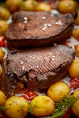 Image showing Close up of Roasted Duck or Goose breast. Served with baked pota