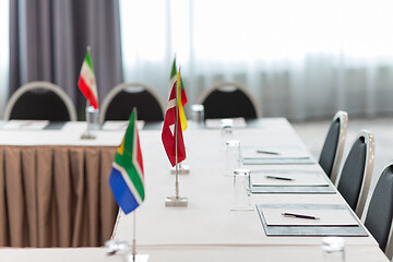 Image showing table in boardroom at international conference