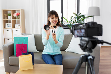 Image showing female beauty blogger making video about make up