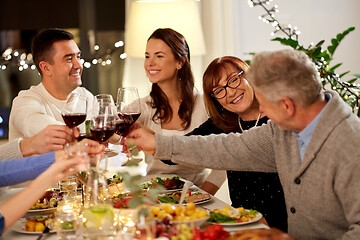 Image showing happy family having dinner party at home