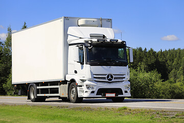 Image showing White Mercedes-Benz Truck on Road