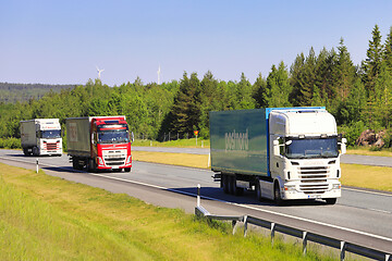 Image showing Semi Trailer Trucks Deliver Goods on Freeway