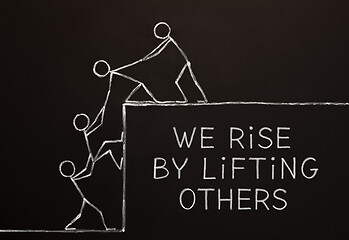 Image showing We Rise By Lifting Others Concept
