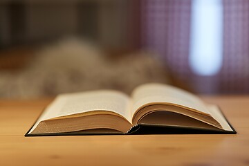 Image showing Book in a table in a room