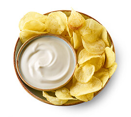 Image showing bowl of potato chips and sour cream souce