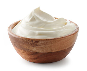 Image showing wooden bowl of whipped sour cream yogurt