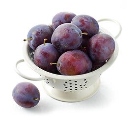 Image showing fresh ripe plums in colander
