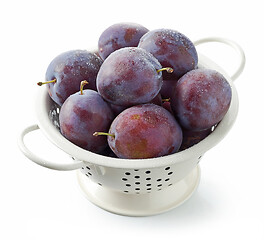 Image showing fresh ripe plums in colander