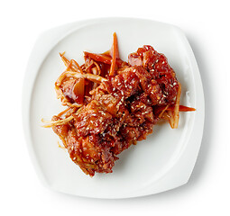 Image showing plate of fried meat in teriyaki sauce