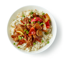 Image showing fried rice and vegetables with hot chicken sauce