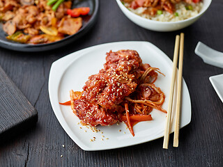 Image showing plate of fried meat in teriyaki sauce