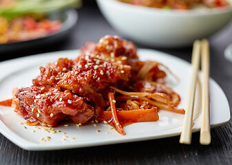 Image showing plate of fried meat in teriyaki sauce