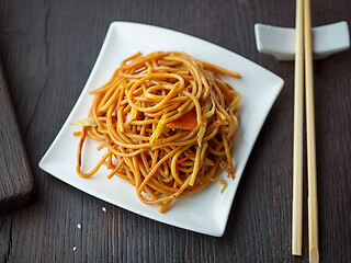 Image showing plate of fried noodles with vegetables