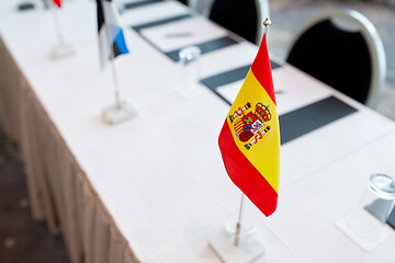 Image showing flags at international conference boardroom