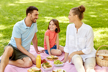 Image showing happy family having picnic at summer park