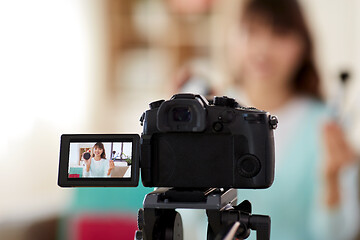 Image showing female beauty blogger making video about make up