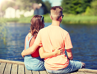 Image showing happy teenage couple hugging on river summer berth