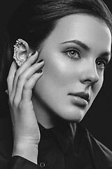 Image showing Beautiful girl with pearls on ear