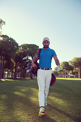 Image showing golf player walking