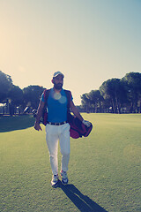 Image showing golf player walking