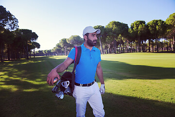 Image showing golf player walking