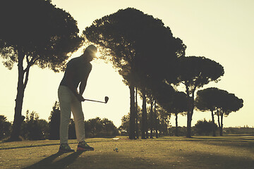 Image showing golf player hitting shot