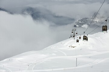 Image showing Ski lift cabin in snowy mountain landscape