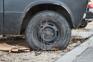 Image showing Flat Tire on abandoned wreck