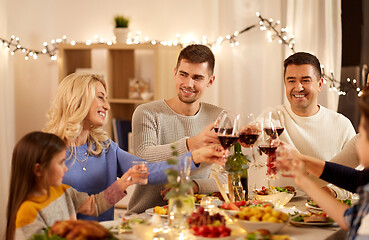 Image showing happy family having dinner party at home