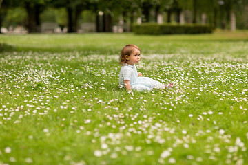 Image showing happy little baby girl at park in summer