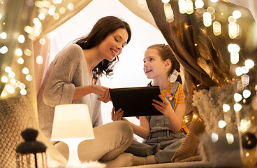 Image showing family with tablet pc in kids tent at home