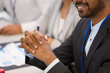 Image showing close up of businessman at business conference