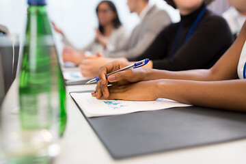 Image showing hands of businesswoman at business conference