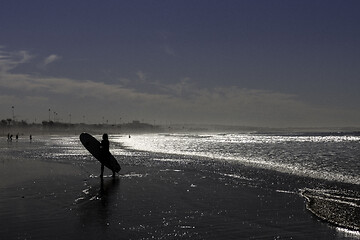 Image showing Returning from the surfs