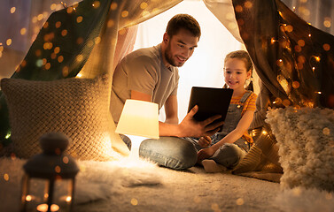 Image showing family with tablet pc in kids tent at home