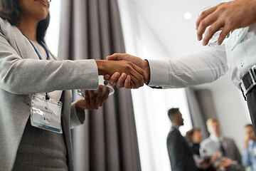 Image showing handshake of people at business conference