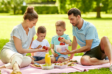 Image showing happy family having picnic at summer park