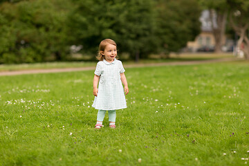 Image showing happy baby girl at summer park