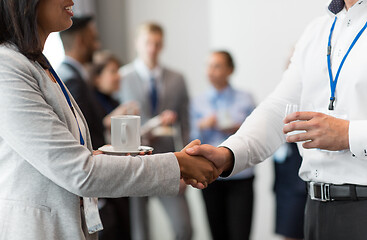 Image showing handshake of people at business conference