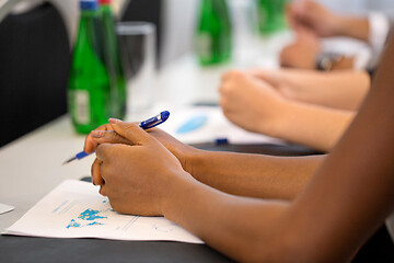 Image showing hands of businesswoman at business conference