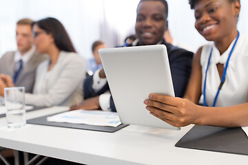 Image showing people with tablet computer at business conference