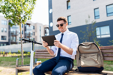 Image showing businessman with tablet computer, bag and scooter