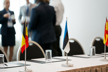 Image showing table in boardroom at international conference