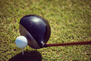 Image showing top view of golf club and ball in grass