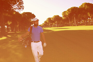 Image showing golf player walking